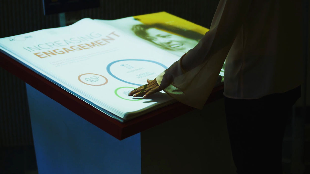 Photograph of someone touching the interactive book