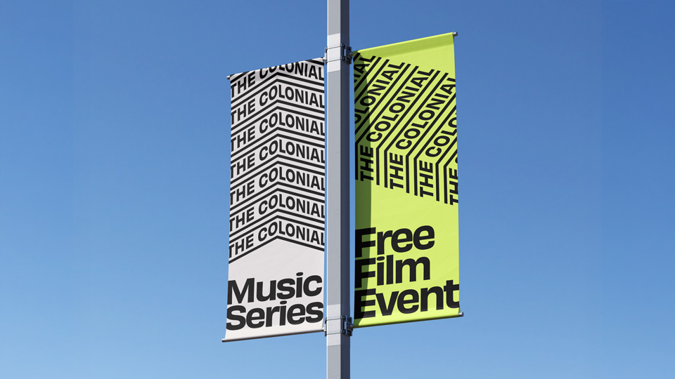 Light pole banners featuring the logo and promotional content for the Colonial Theatre