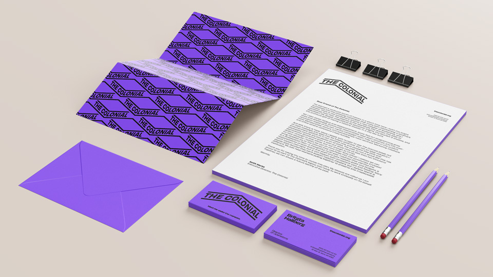 A custom stationery system including letterhead, business card, and envelope 